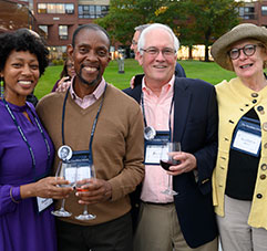 Four people smiling together. Link to Closely Held Business Stock