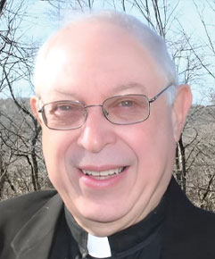 Rev. Canon Lance Beizer ’56 smiling